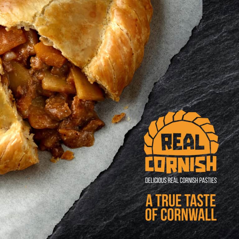 Real Cornish pasty filled with beef and vegetables on slate